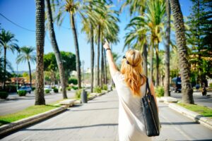 blonde woman pointing