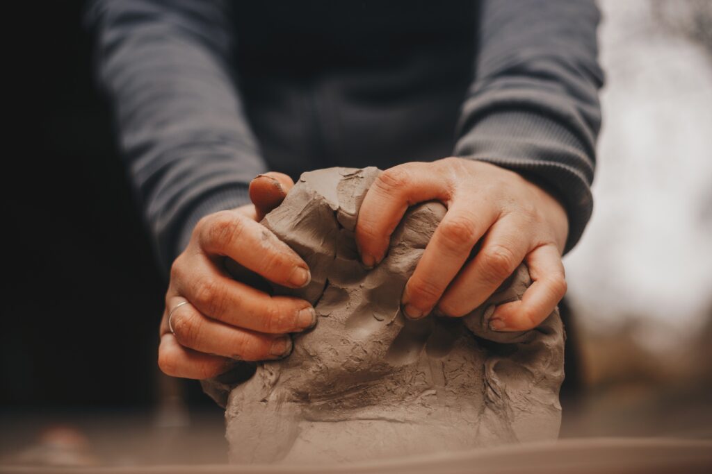 potter with clay